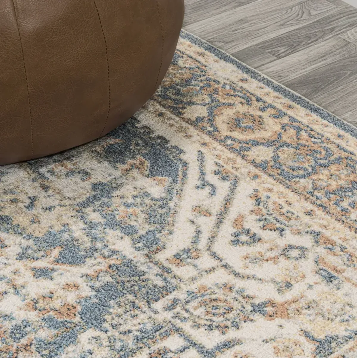 Keesha Bold Distressed Medallion Low-Pile Machine-Washable Blue/Cream. Area Rug