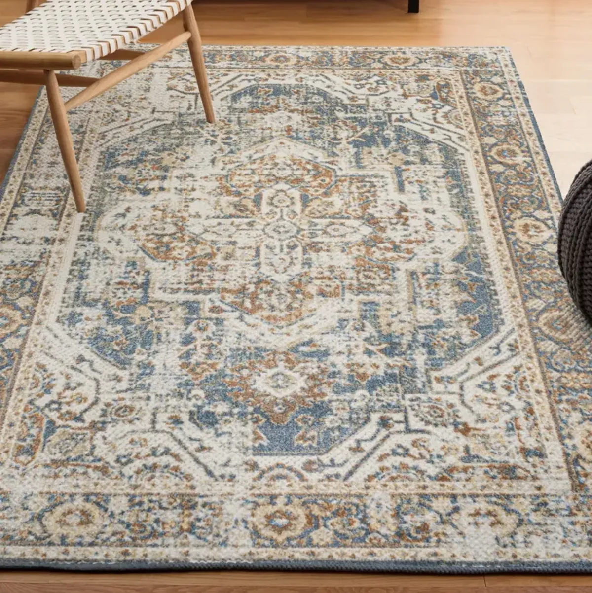 Keesha Bold Distressed Medallion Low-Pile Machine-Washable Blue/Cream. Area Rug