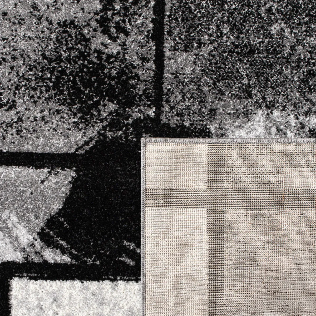 Black-White Area Rug with Modern Abstract Paint Effect