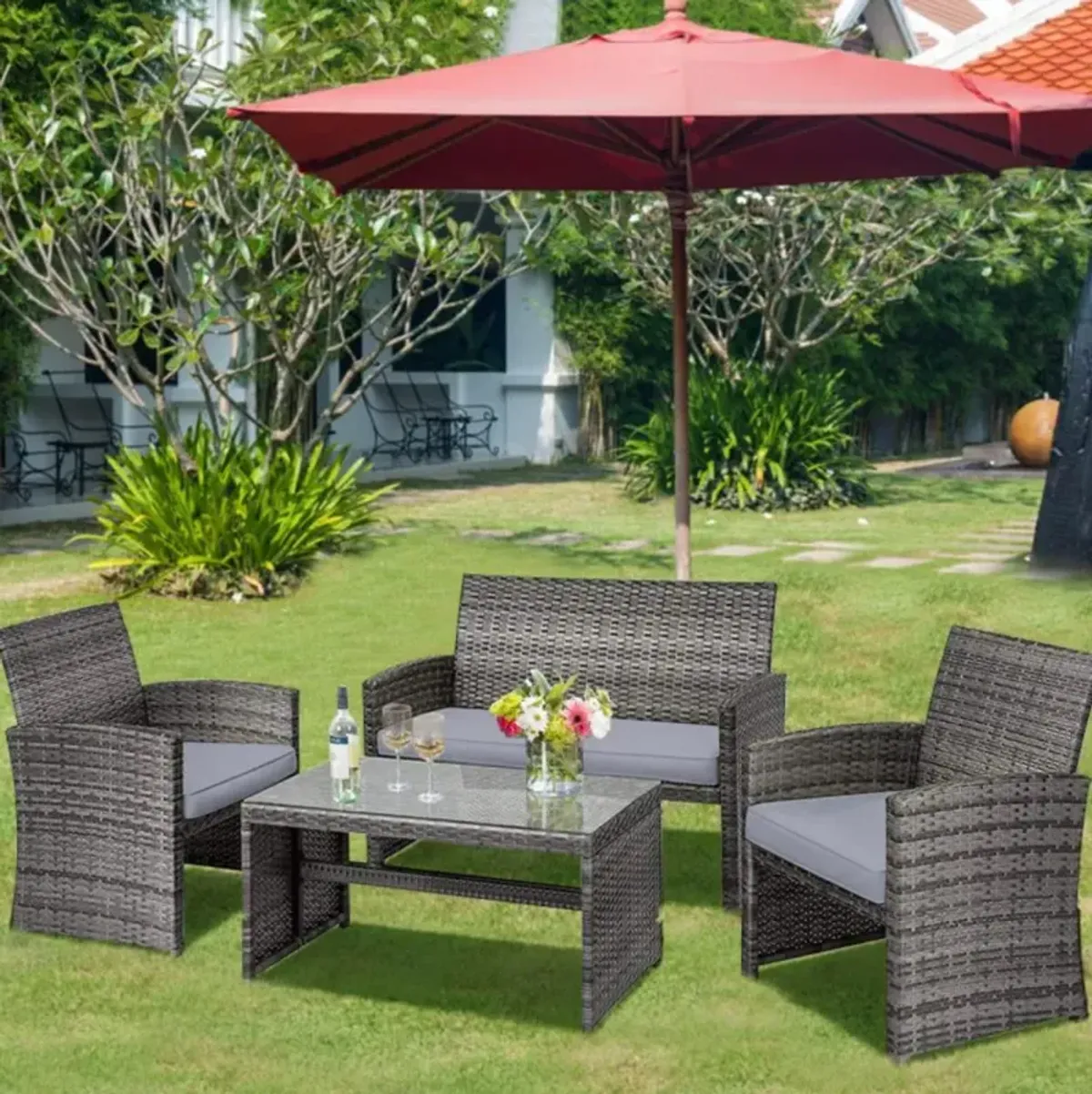 Hivvago 4 Pieces Patio Rattan Furniture Set with Glass Table and Loveseat