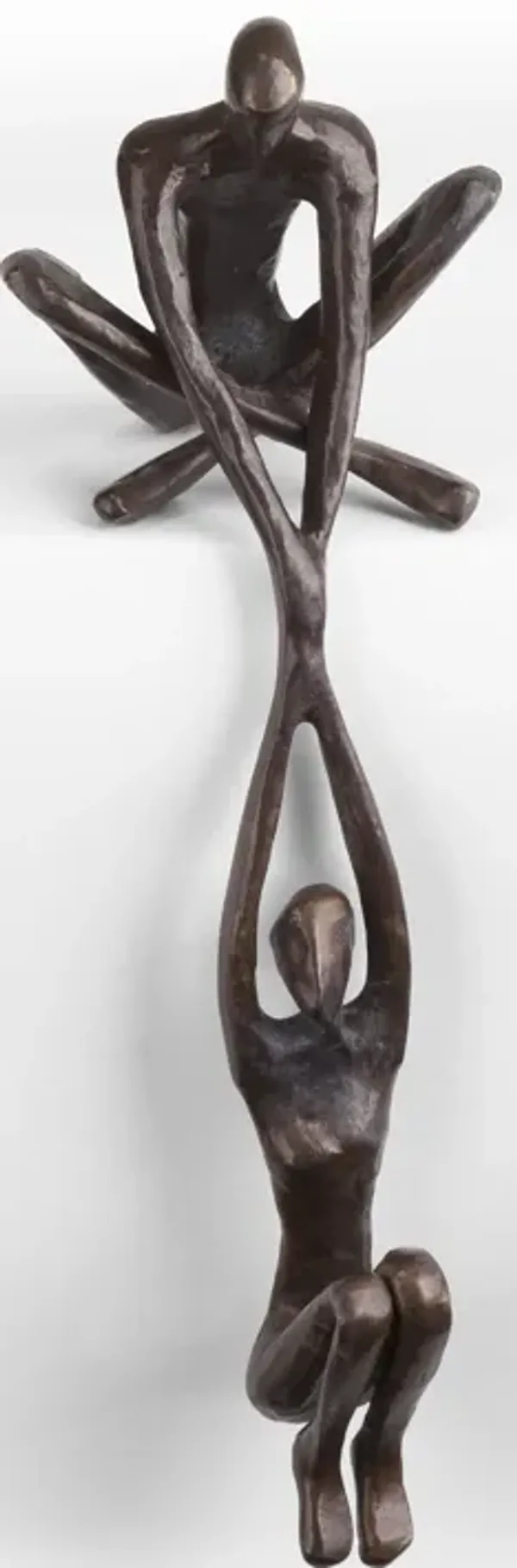Man Lifting Woman from Ledge Bronze Sculpture