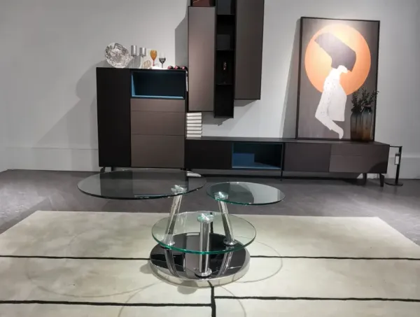 Motion coffee table with clear glass  top and chrome base