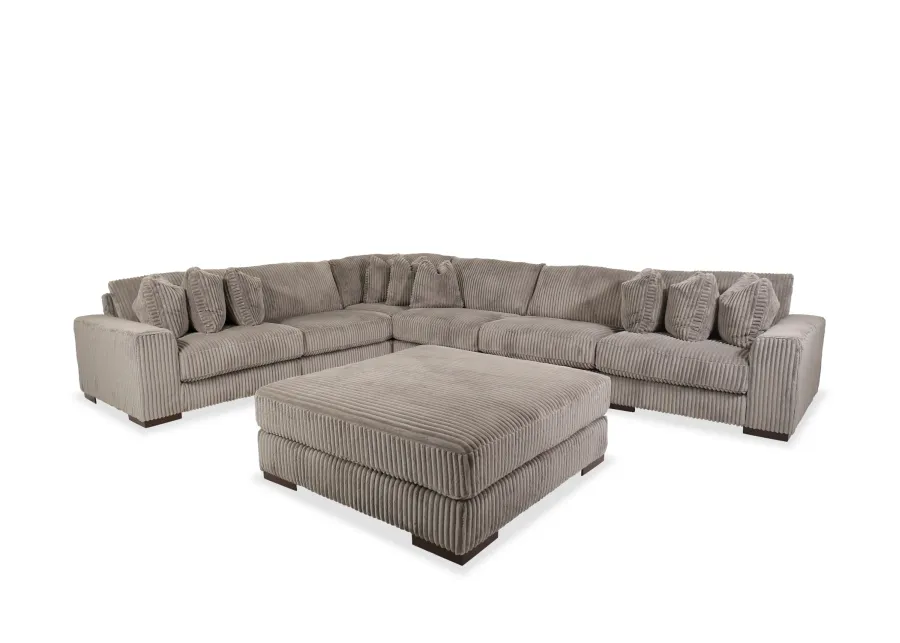 Lindyn Six-Piece Sectional and Ottoman Set