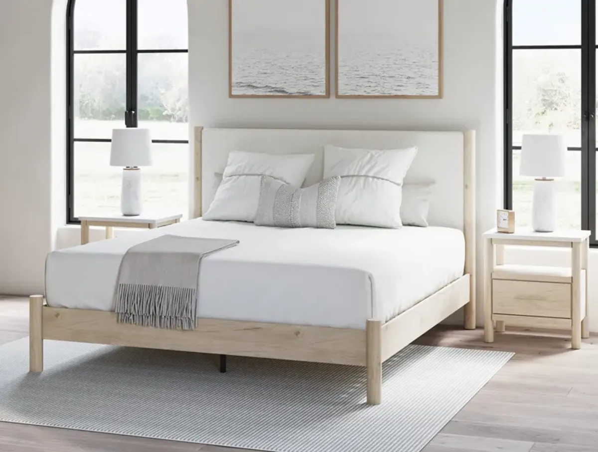 Cadmori Queen Upholstered Panel Bed