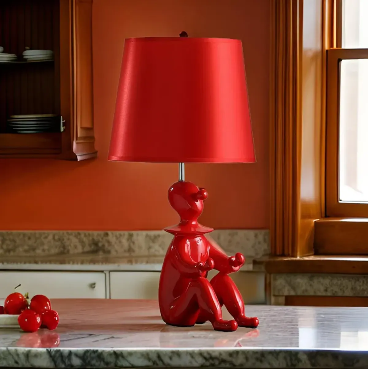 Fabric Shade Table Lamp with Polyresin Sitting Clown Base, Red - Benzara