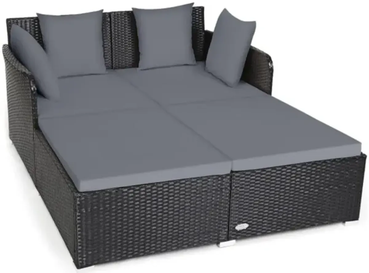 Hivvago Spacious Outdoor Rattan Daybed with Upholstered Cushions and Pillows-Black