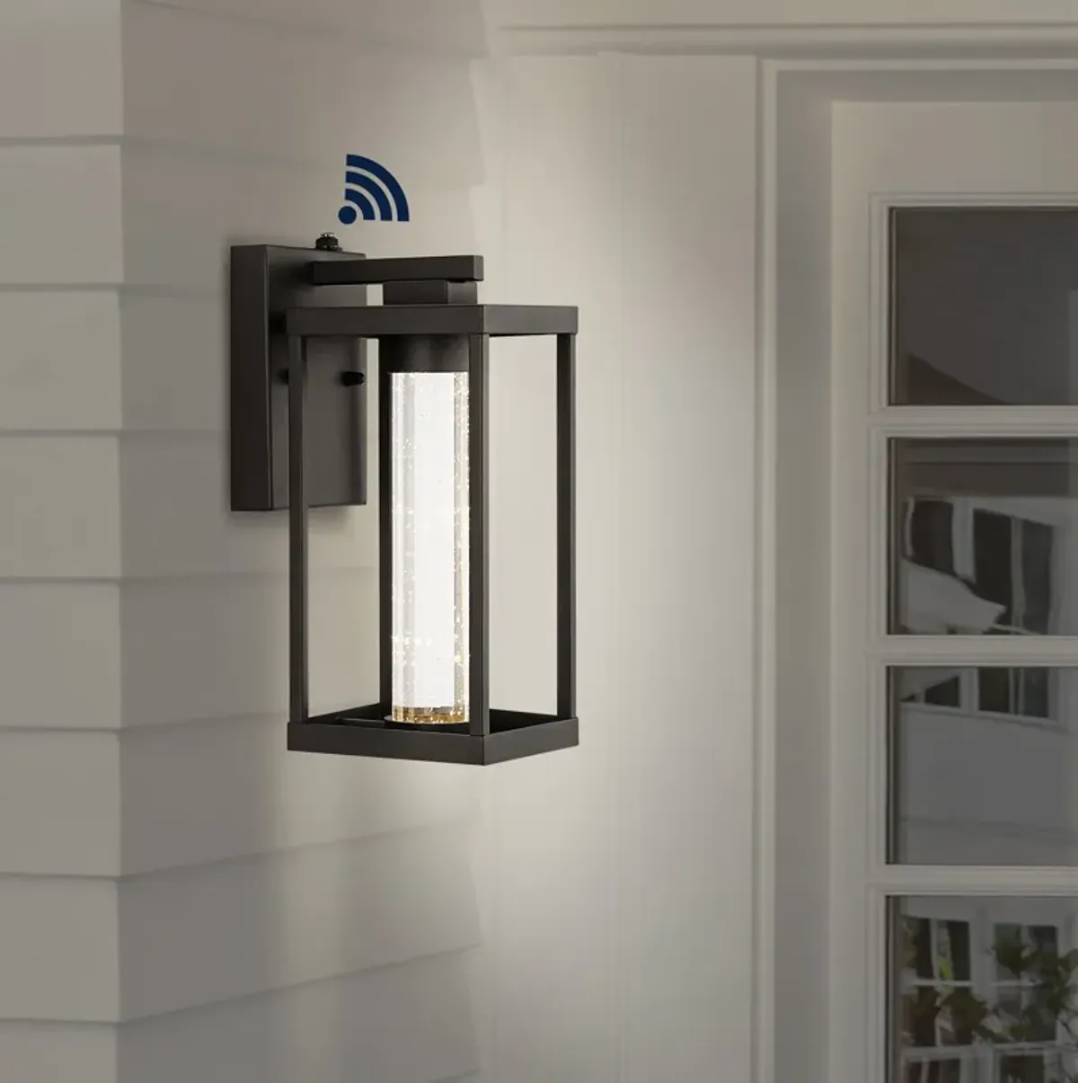 Juno 1-Light Industrial Vintage Iron/Seeded Glass with Dusk-to-Dawn Sensor Integrated LED Outdoor Sconce