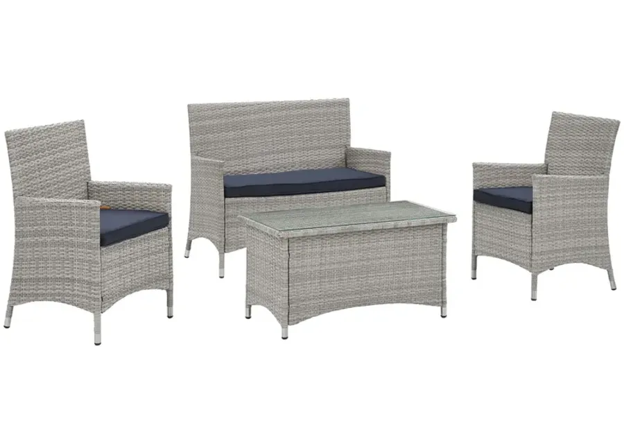 Bridge Wicker Rattan Outdoor Patio Sectional Sofa Set - Gray Distressed Chic Style. Sturdy Aluminum Frame, Tempered Glass Coffee Table. All-Weather Cushions. Perfect for Contemporary Outdoor Spaces. Includes Loveseat, Armchairs, and Coffee Table.