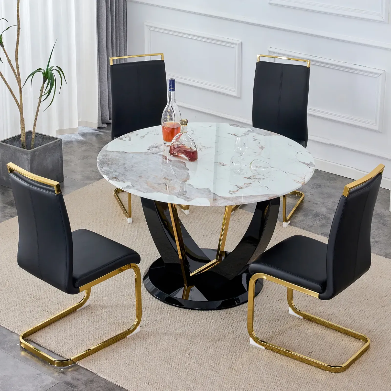 Table and chair set. 1 table and 4 chairs. Round Pandora style stone burning tabletop with black MDF legs. Paired with 4 chairs with PU black cushions and golden legs.908 1162