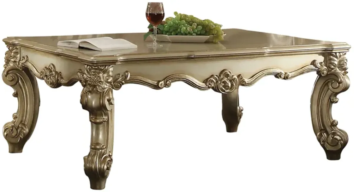 Yardlio Vendome II Coffee Table - Gold Patina & Bone, Wooden Top, Scrolled Leg & Apron, Oversized Leg, 52.95 L x 35.63 W x 21.26 H