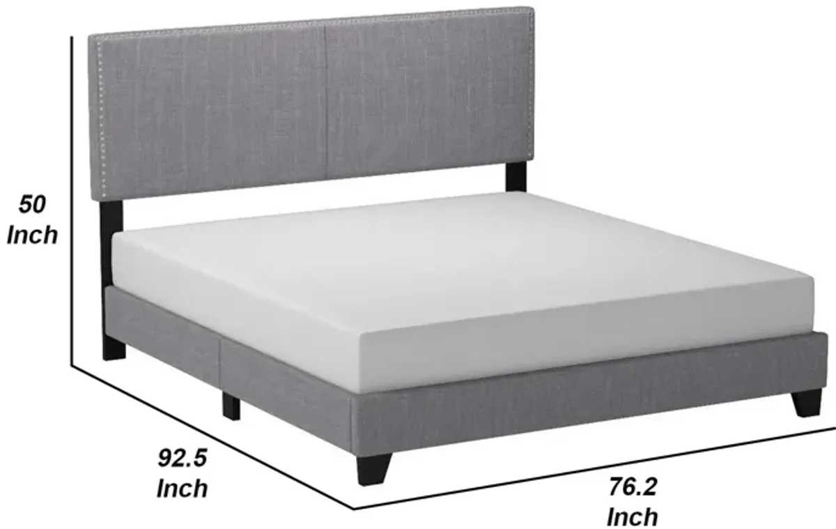 California King Bed with Padded Headboard and Nailhead Trim, Gray-Benzara