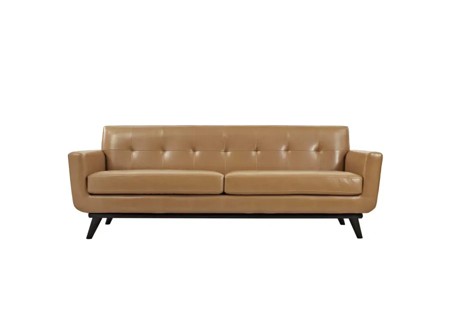 Engage Leather Sofa - Ultimate Lounging Experience with Curves, Dual Cushions, and Cherry Wood Legs. Perfect for Relaxation, Coffee Time, and Lively Conversations. Includes 7 Eye-Catching Buttons.