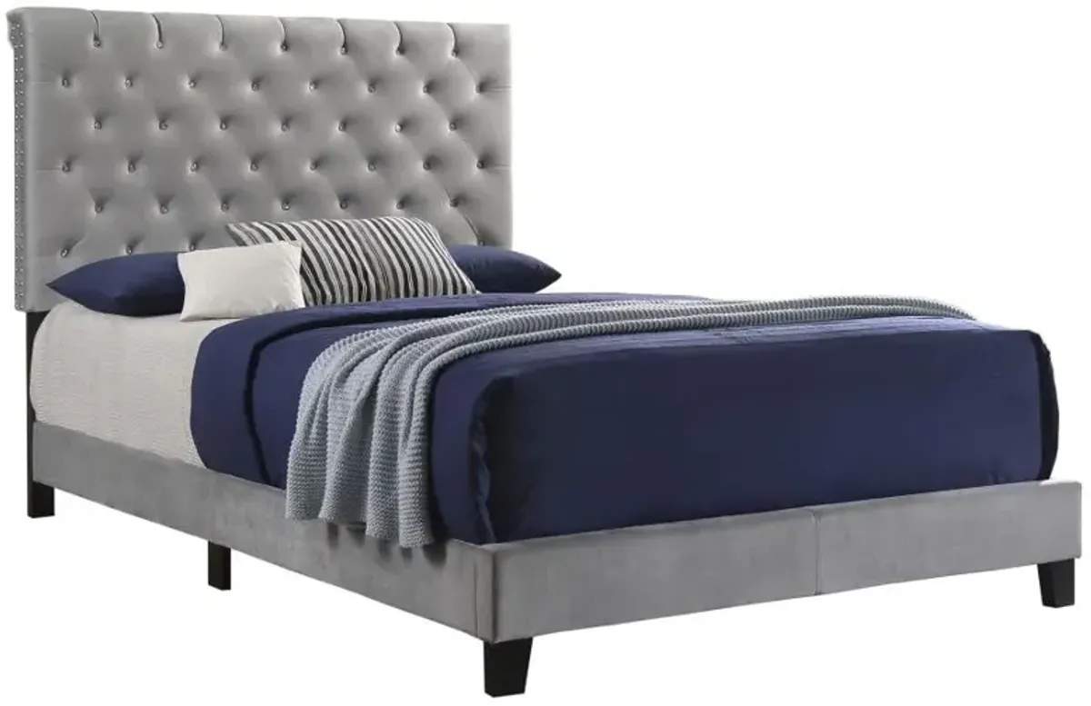 Warner Eastern King Upholstered Bed Grey