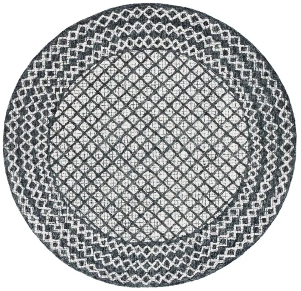 ABSTRACT Hand Tufted 6' x 6' Round area rug