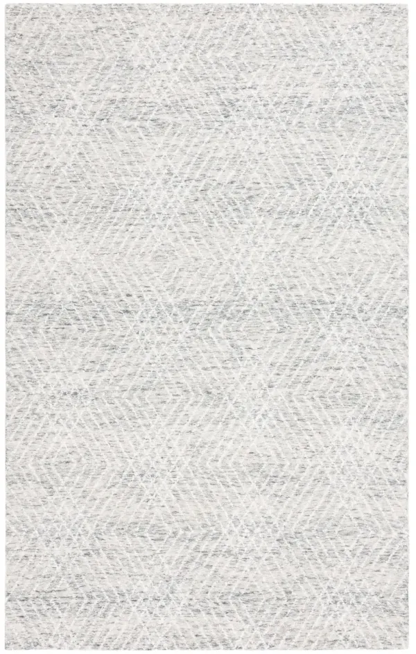 ABSTRACT Hand Tufted 5' x 8' area rug