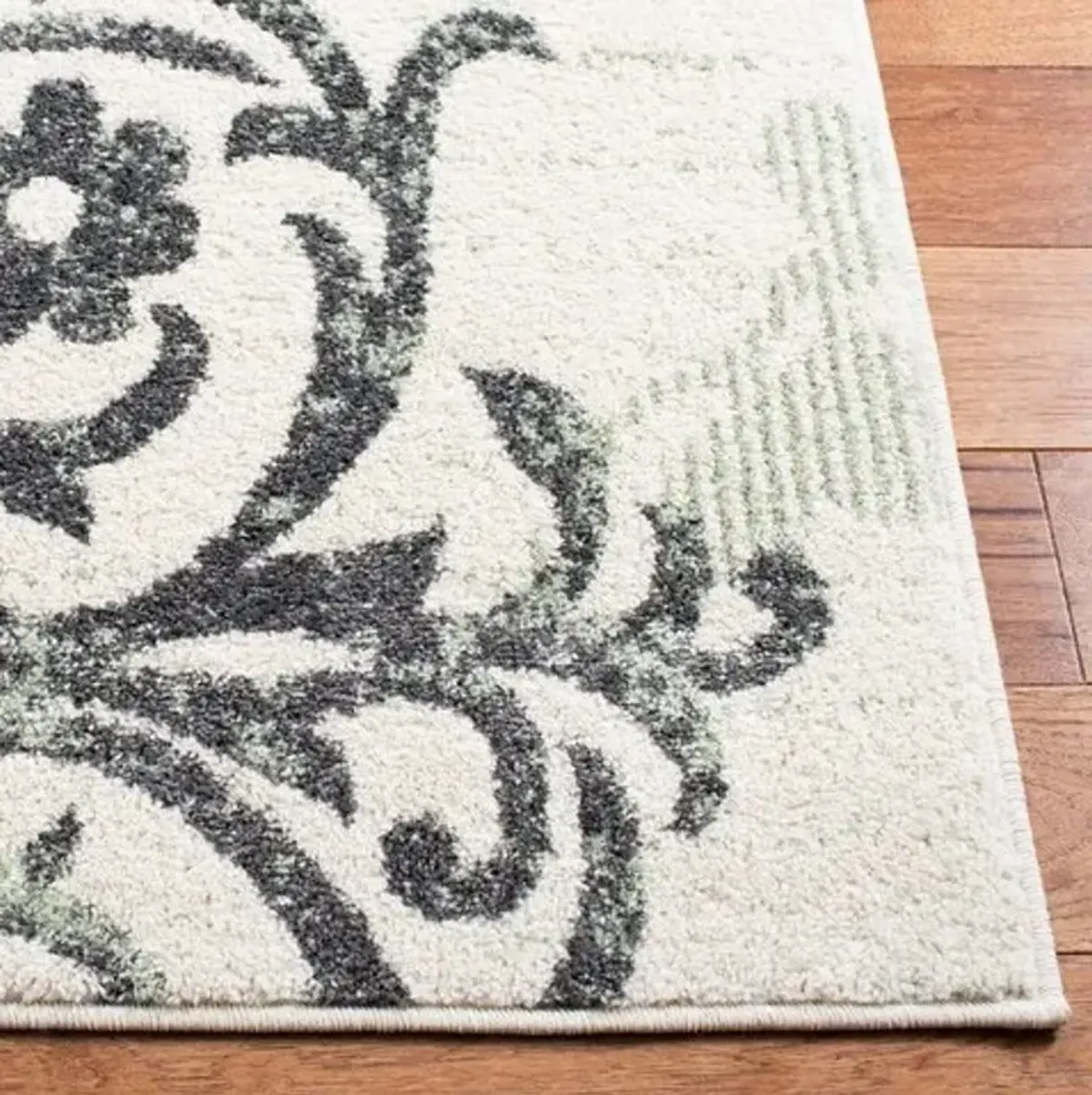 Adirondack Contemporary Ivory / Green 5'-5" X 7'-7" Powerloomed Rug