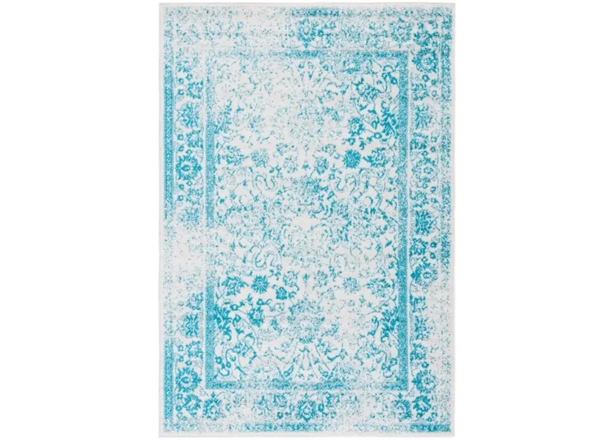 Adirondack Contemporary Ivory / Teal 6' X 9' Powerloomed Rug