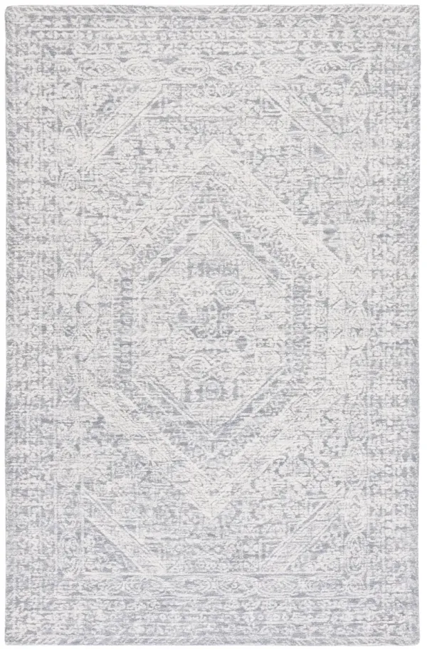 METRO Hand Tufted 5' x 8' area rug