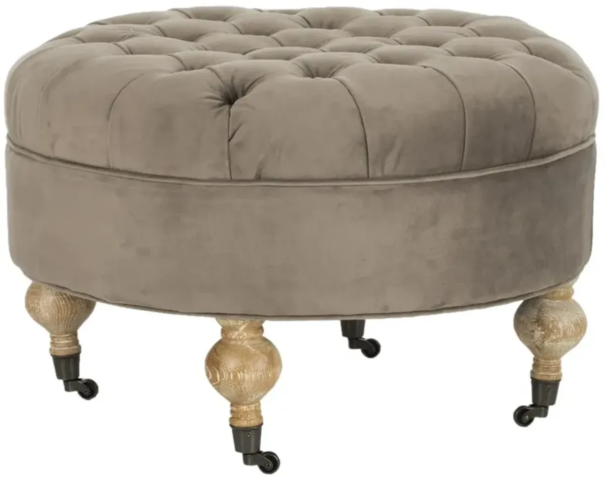 CLARA TUFTED ROUND OTTOMAN