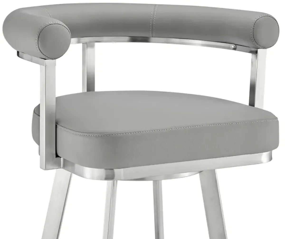 Nolagam Swivel Counter Stool in Brushed Stainless Steel with Light Gray Faux Leather