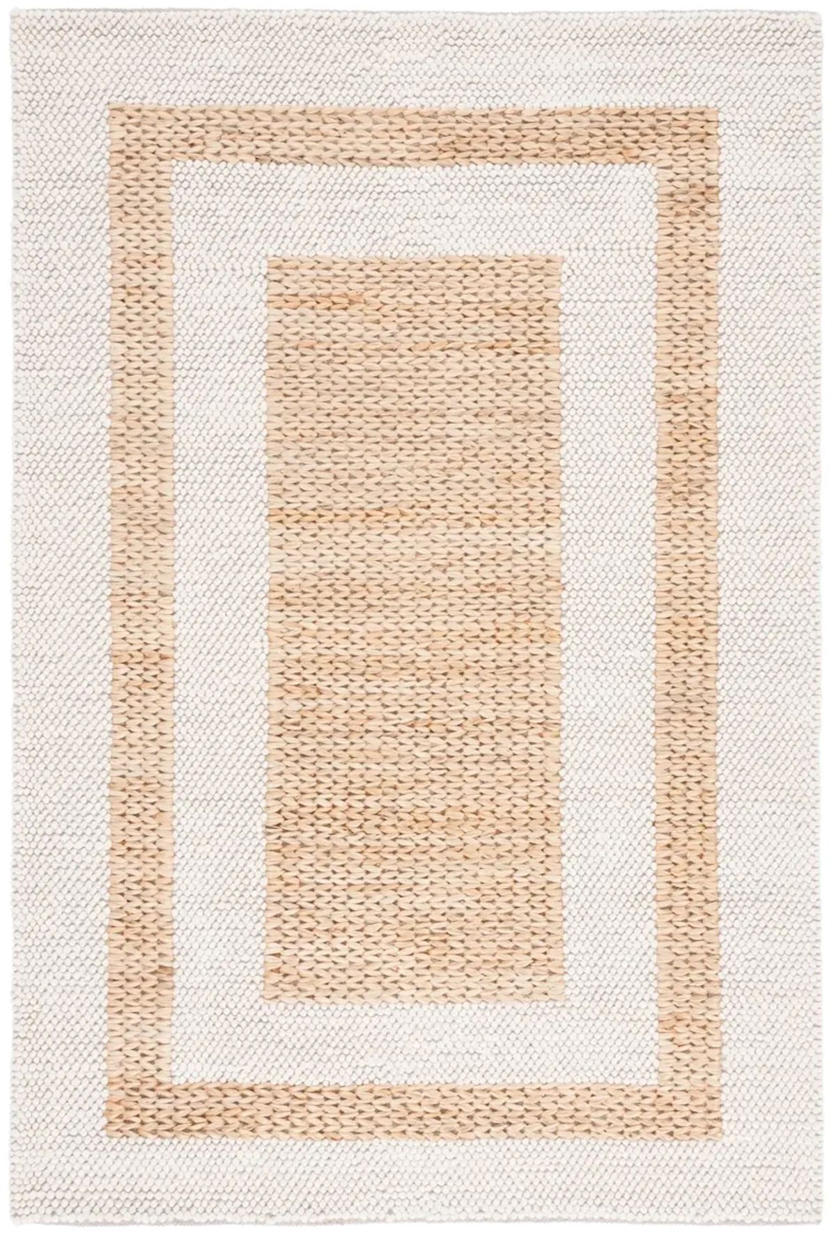 NATURA Hand loomed 6' x 9' area rug
