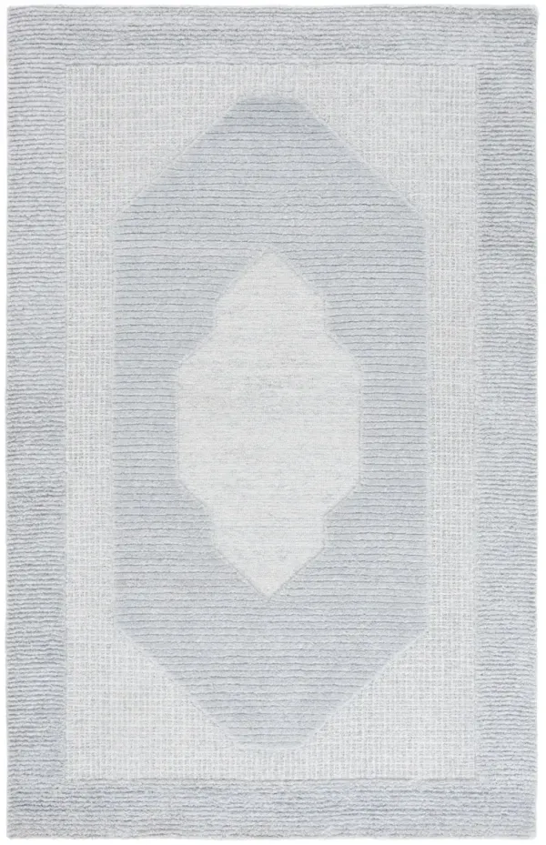 RENEWAL Hand Tufted 5' x 8' area rug