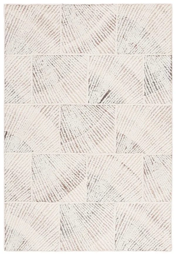ABSTRACT Hand Tufted 6' x 9' area rug