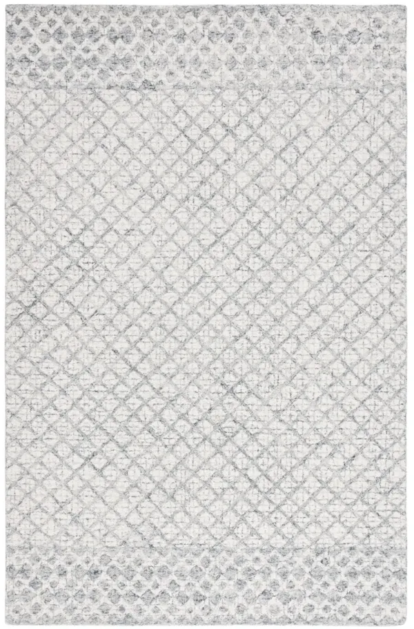 ABSTRACT Hand Tufted 3' x 5' area rug