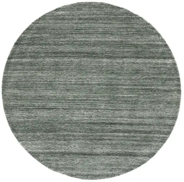 MIRAGE Hand Tufted 6' x 6' Round area rug