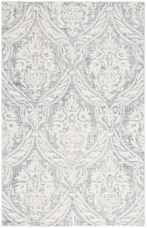 ABSTRACT Hand Tufted 5' x 8' area rug