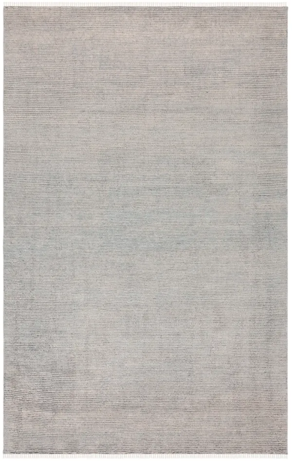 NOMAD Hand knotted 6' x 9' area rug