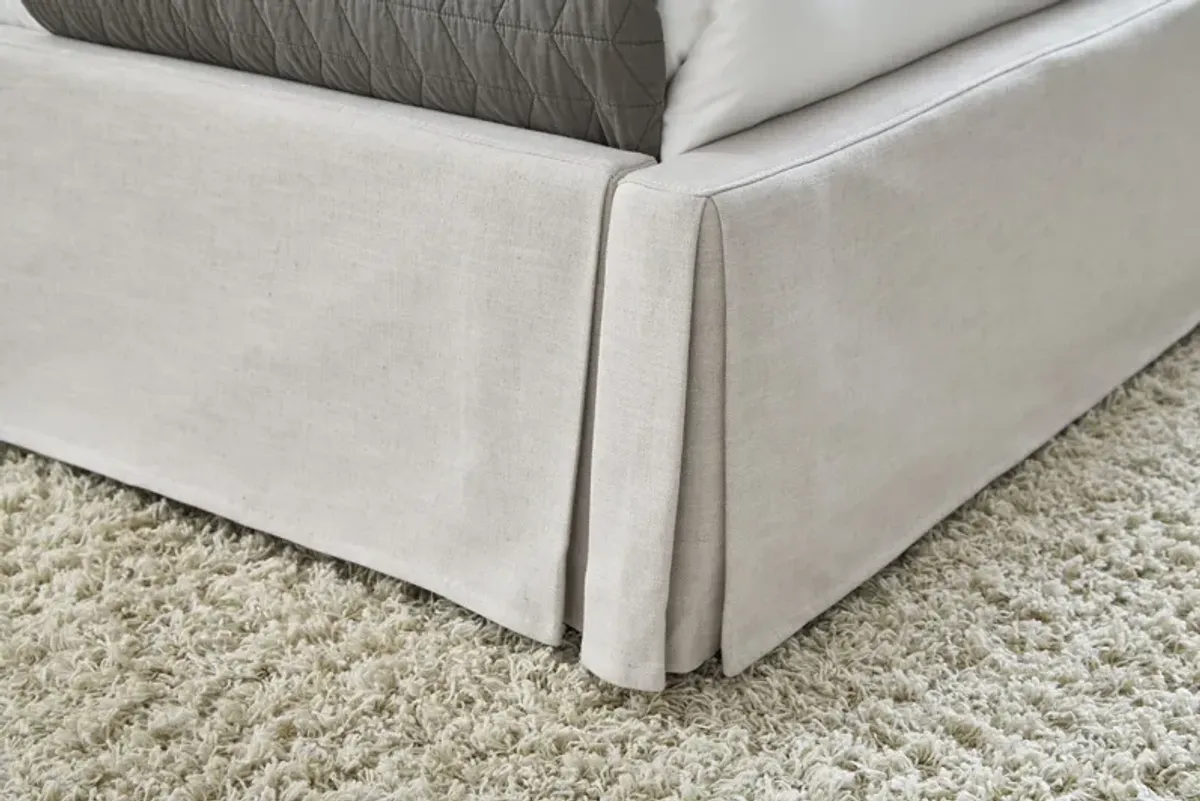 Hera King-Size Upholstered Skirted Panel Bed in Oatmeal