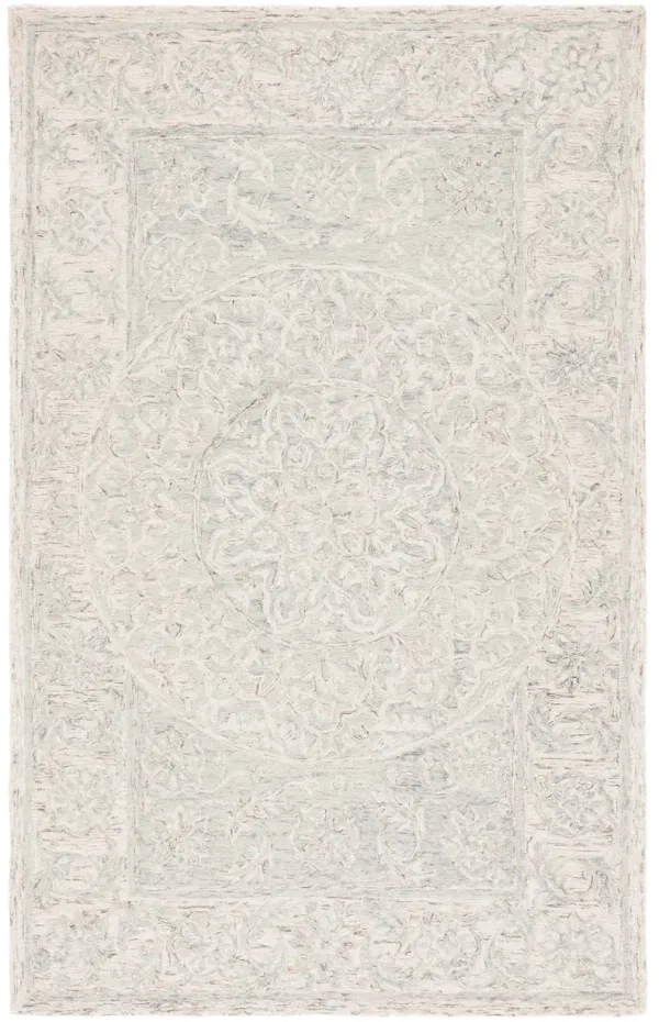MICRO-LOOP Hand Tufted 5' x 8' area rug