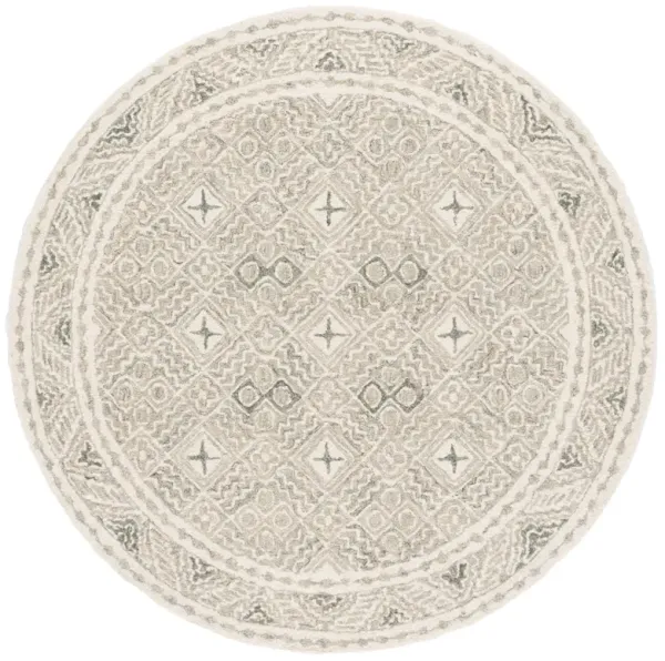 MICRO-LOOP Hand Tufted 5' x 5' Round area rug