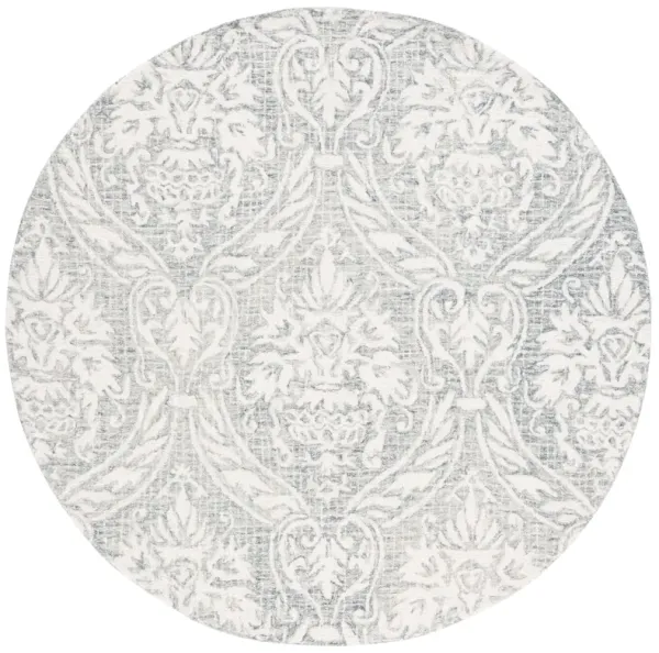 ABSTRACT Hand Tufted 6' x 6' Round area rug