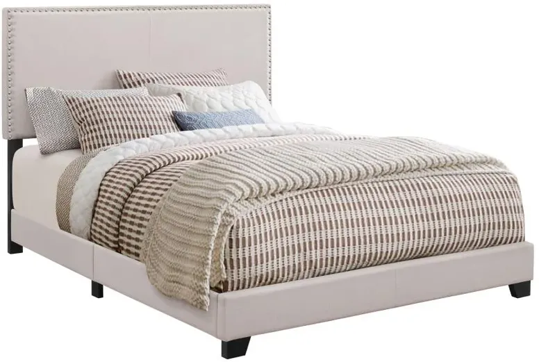 Boyd Eastern King Upholstered Bed with Nailhead Trim Ivory