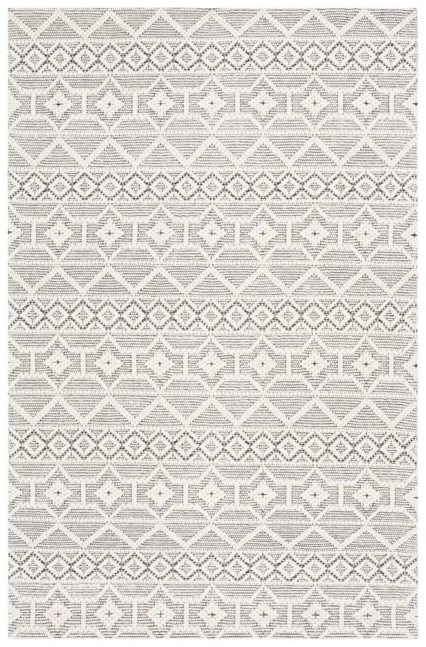 MARBELLA Hand loomed 6' x 9' area rug