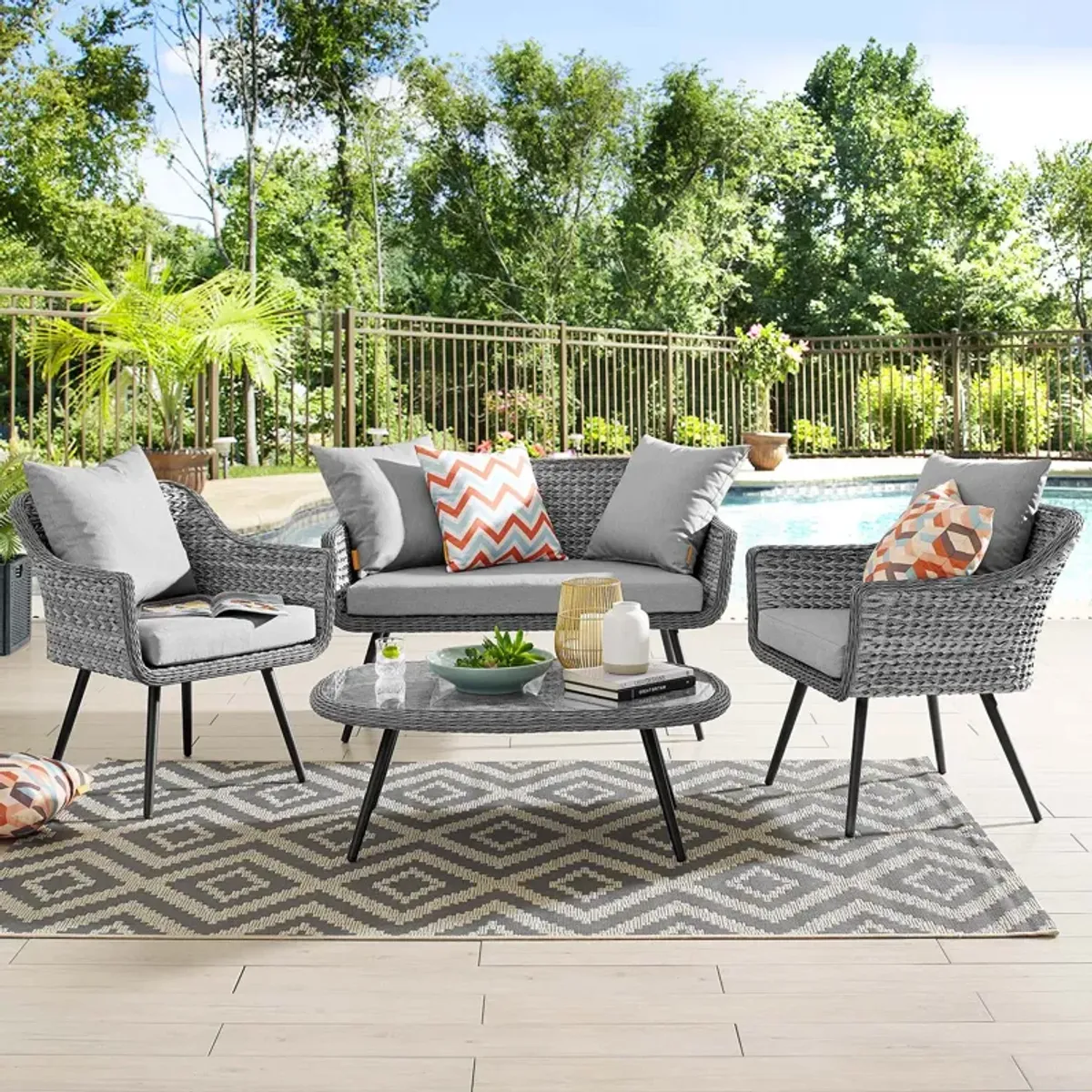 Endeavor 4 Piece Outdoor Patio Wicker Rattan Loveseat Armchair and Coffee Table Set