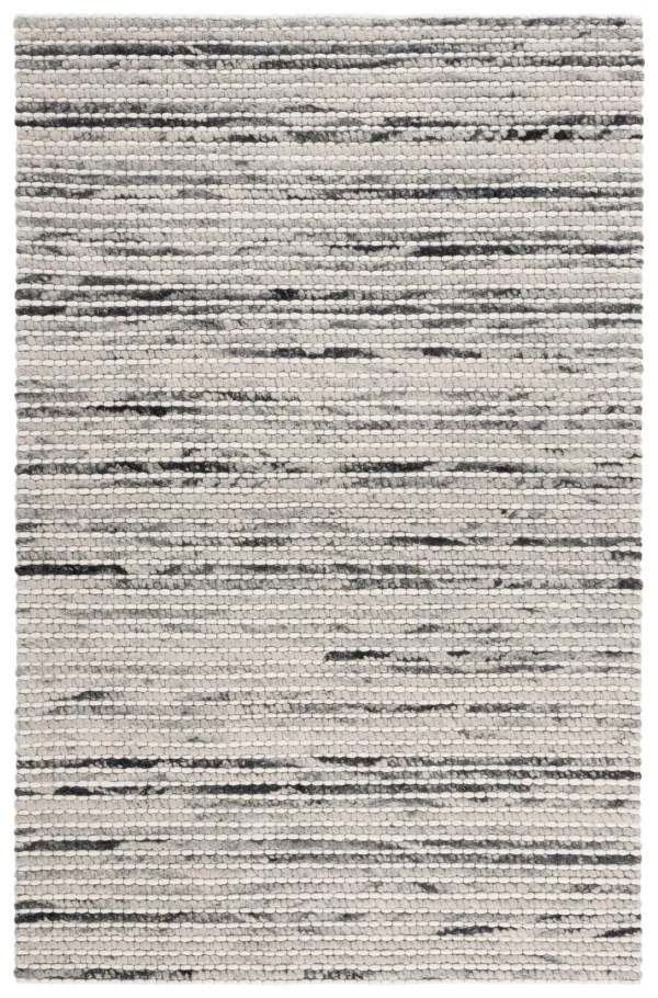 MARBELLA Hand Woven 5' x 8' area rug