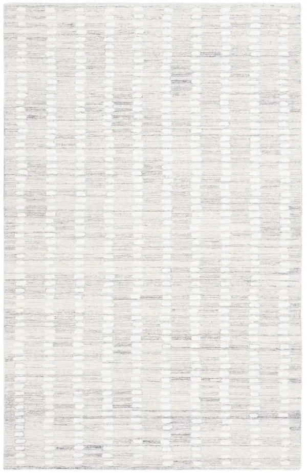 ABSTRACT Hand Tufted 5' x 8' area rug