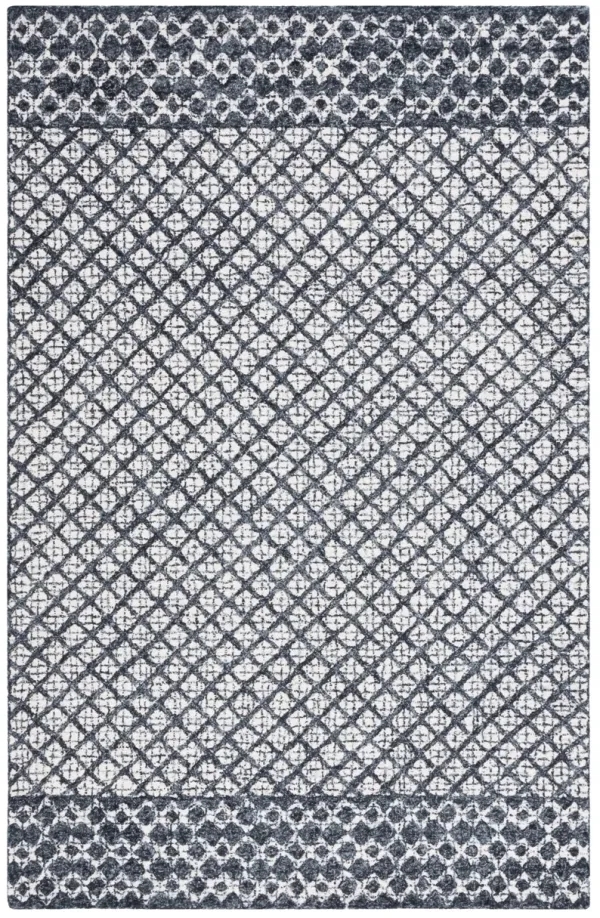 ABSTRACT Hand Tufted 3' x 5' area rug