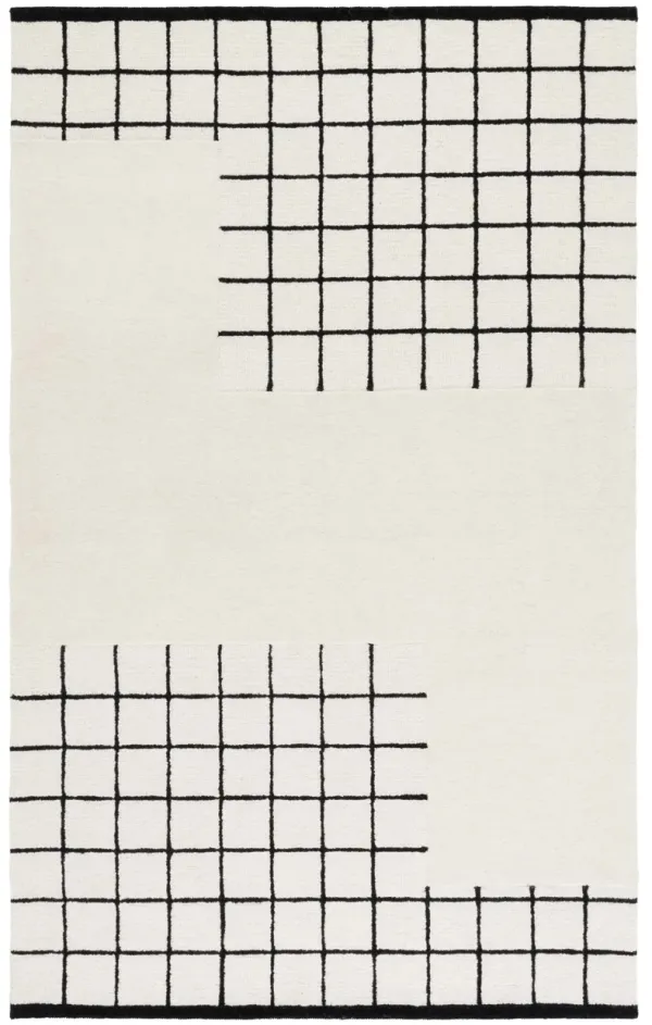 GENRE Hand Tufted 6' x 9' area rug