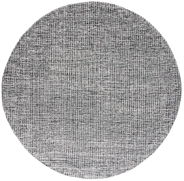 ABSTRACT Hand Tufted 4' x 4' Round area rug