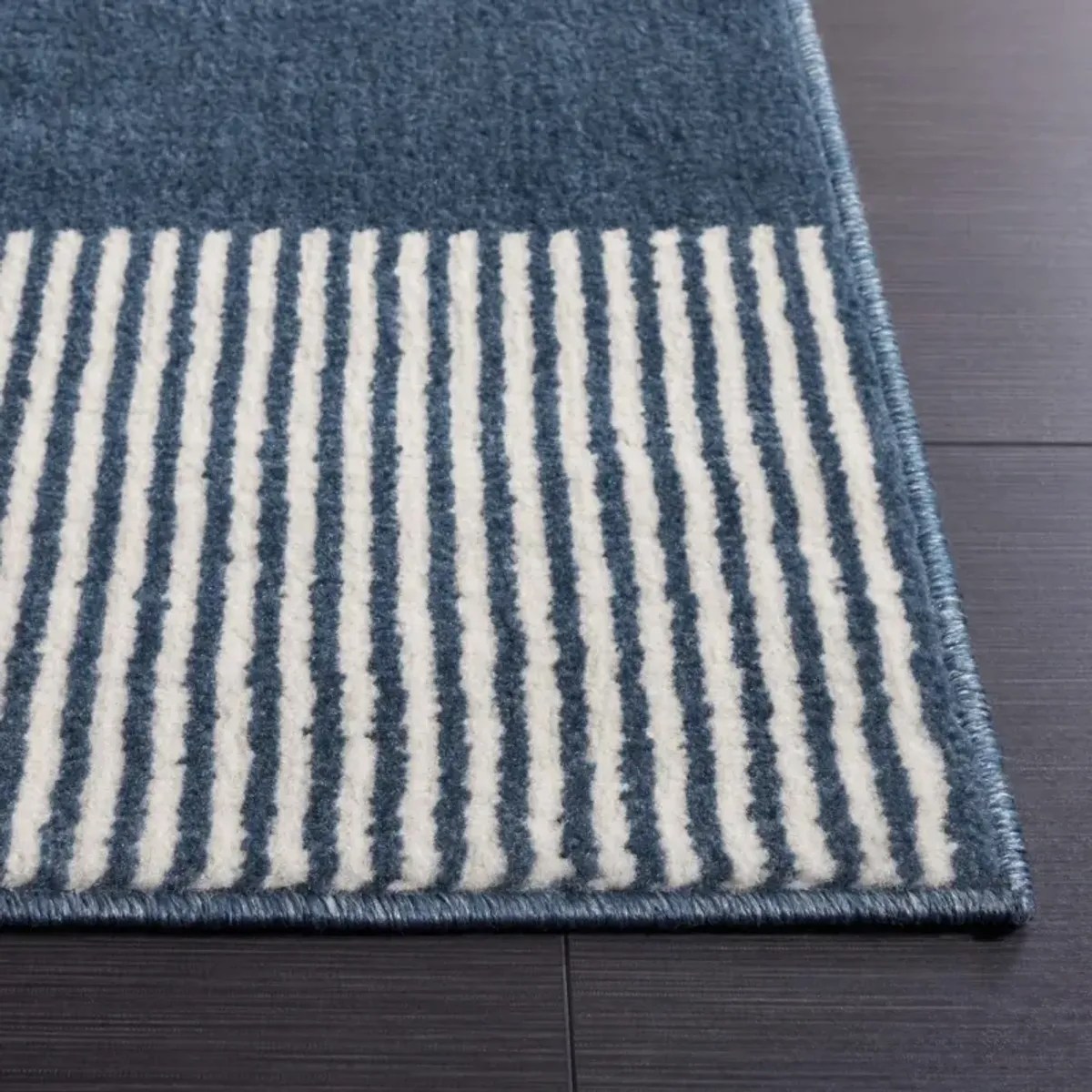 PYRAMID 244 NAVY  2'-2' x 8' Runner Rug