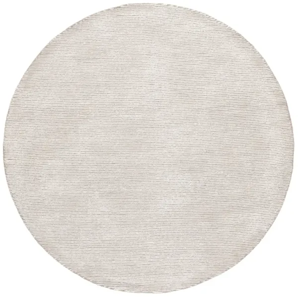 MIRAGE Hand Tufted 6' x 6' Round area rug