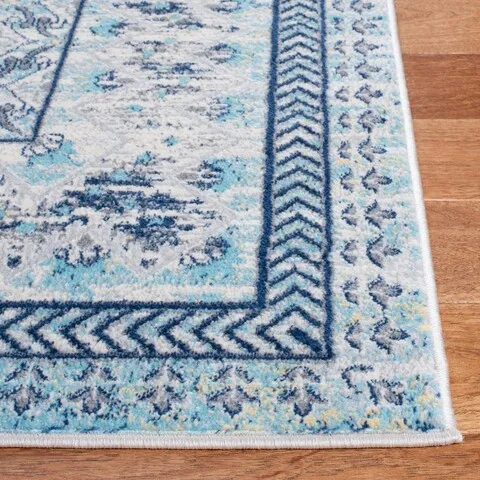 Brentwood 899 Ivory / Aqua 5'-3" X 7'-6" Medium Rectangle Powerloomed Rug