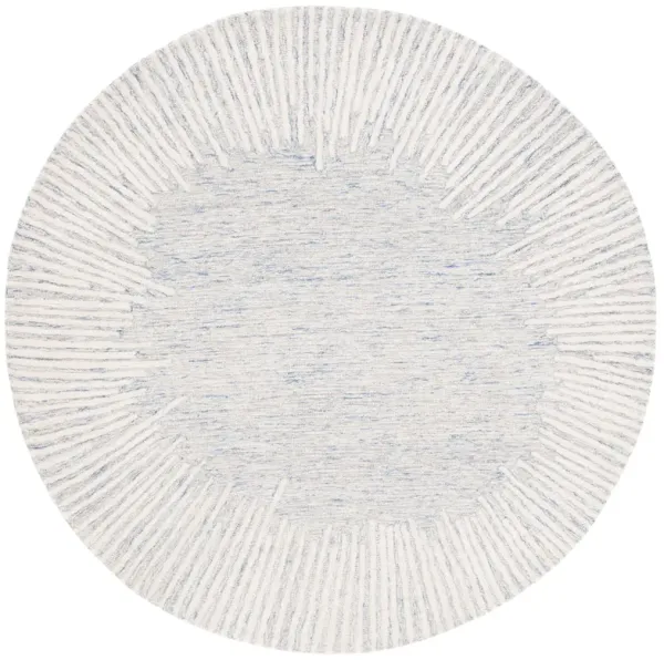 ABSTRACT Hand Tufted 4' x 4' Round area rug