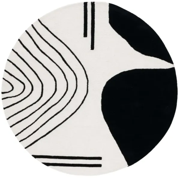 RODEO DRIVE Hand Tufted 4' x 4' Round area rug