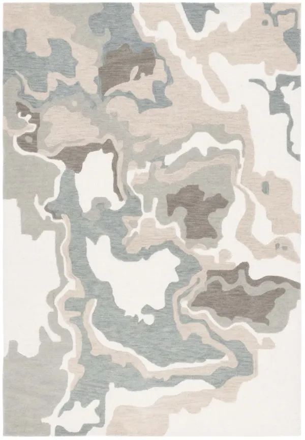 RODEO DRIVE Hand Tufted 5' x 8' area rug