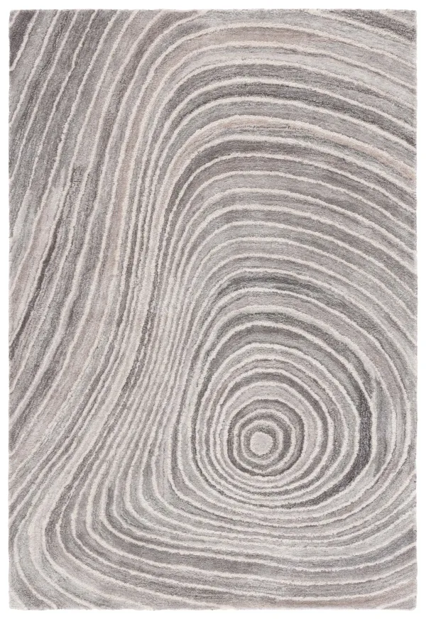 ABSTRACT Hand Tufted 5' x 8' area rug